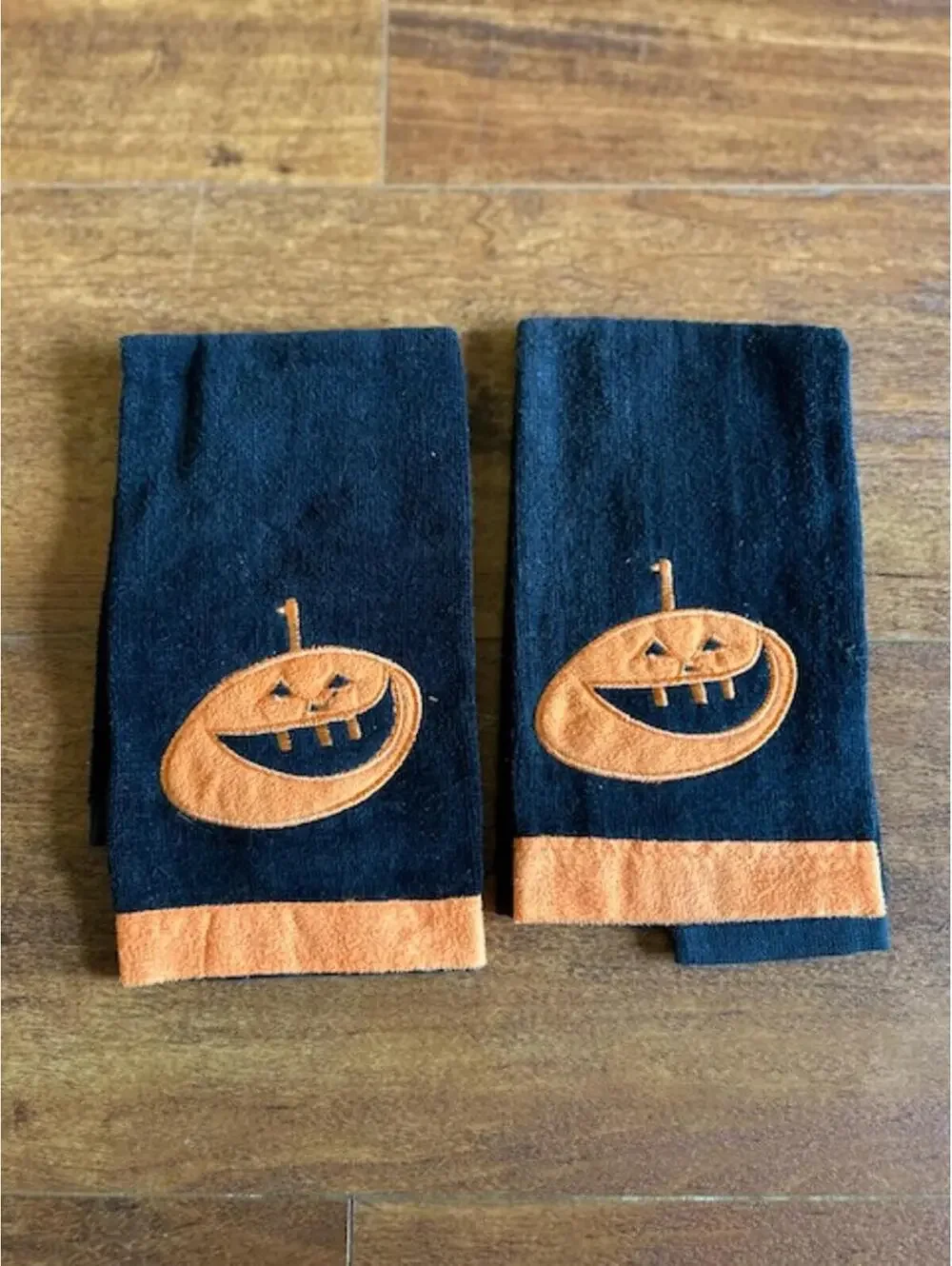 Pair of Black and Orange Halloween Pumpkin Hand Towels